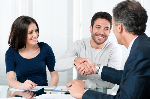 Clients talking to an insurance agent.